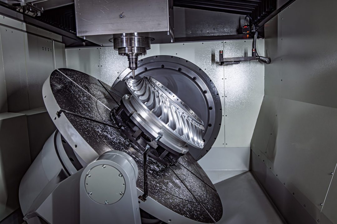 Metalworking CNC lathe milling machine. Cutting metal modern processing technology. Milling is the process of machining using rotary cutters to remove material by advancing a cutter into a workpiece.